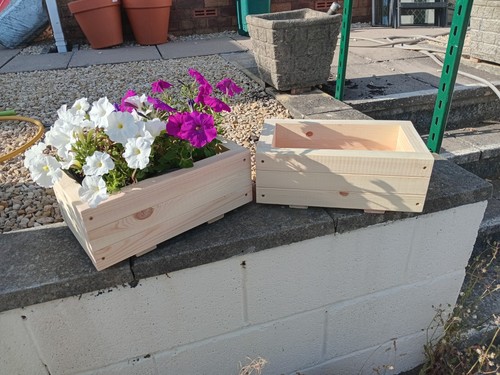 Three oblong planters 37 - planters.,